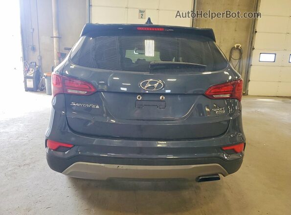 5NMZUDLB3HH030394 2017 HYUNDAI SANTA Black Rear view