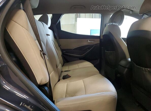 5NMZUDLB3HH030394 2017 HYUNDAI SANTA Black Rear interior view