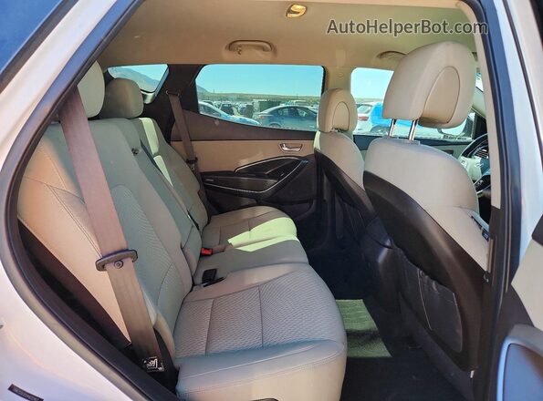 5NMZUDLB5HH032907 2017 HYUNDAI SANTA White Rear seats view