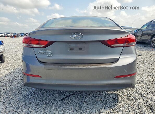 5NPD74LF6JH246253 2018 HYUNDAI ELANTRA Gray Rear view
