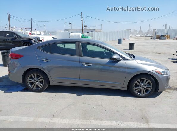 5NPD84LF1JH285636 2018 HYUNDAI ELANTRA Gray Սալոնի հետևի տեսք