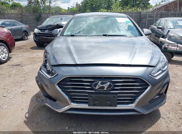 5NPE24AF1JH667531 2018 HYUNDAI SONATA Gray Rear interior view