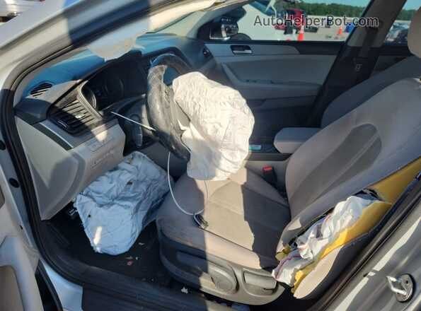 5NPE24AF1KH736509 2019 HYUNDAI SONATA Silver Vista interior delantera