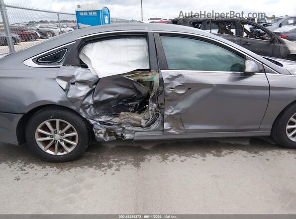 5NPE24AF1KH771499 2019 HYUNDAI SONATA Серый Вид задней части салона