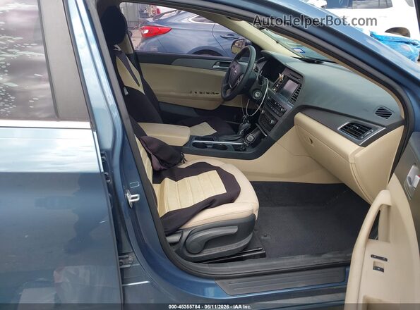 5NPE24AF4GH302950 2016 HYUNDAI SONATA Blue წინა სალონის ხედი