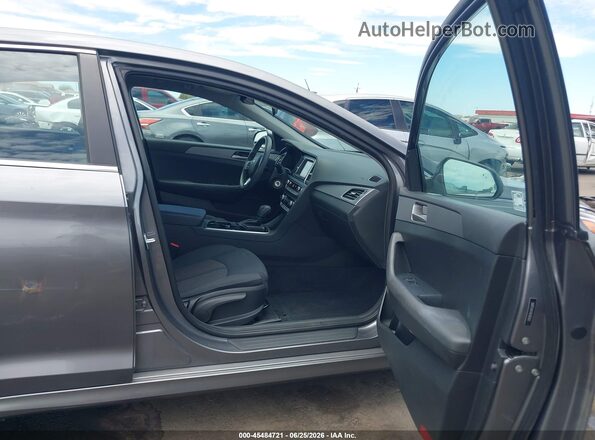 5NPE24AF4KH813471 2019 HYUNDAI SONATA Gray წინა სალონის ხედი
