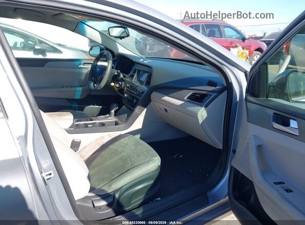 5NPE24AF8GH274599 2016 HYUNDAI SONATA Gray Front interior view