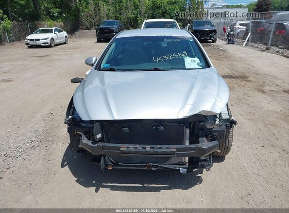 5NPE24AF8JH616446 2018 HYUNDAI SONATA Silver Вид задньої частини салону