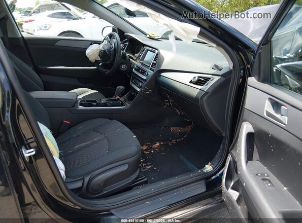 5NPE24AF9KH805916 2019 HYUNDAI SONATA Черный Вид салона спереди