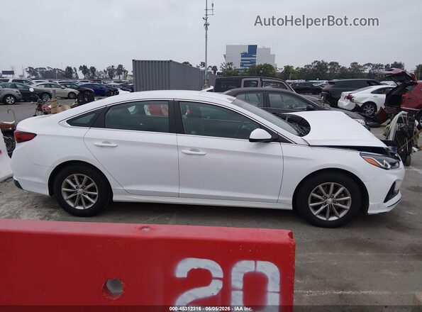 5NPE24AFXKH750411 2019 HYUNDAI SONATA White Вид задньої частини салону