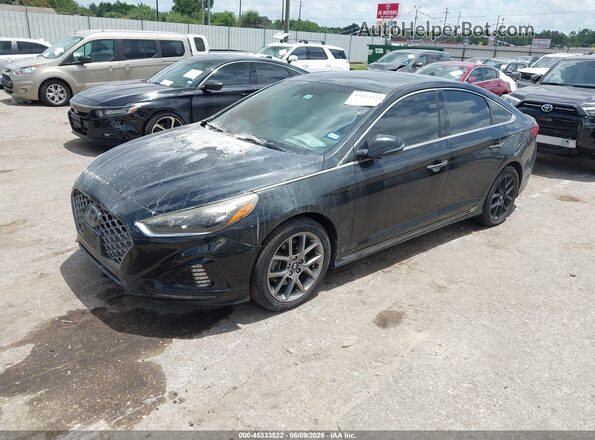 5NPE34AB0JH669409 2018 HYUNDAI SONATA Black Vista tres cuartos delantera izquierda