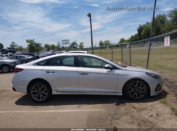 5NPE34AB2KH745701 2019 HYUNDAI SONATA Silver Rear interior view