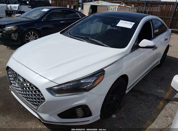 5NPE34AB9KH759627 2019 HYUNDAI SONATA White წინა მარცხენა ხედი სამი მეოთხედიდან