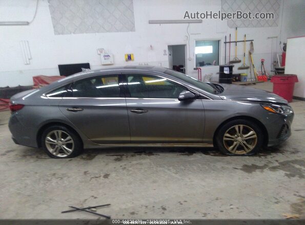 5NPE34AF0JH716117 2018 HYUNDAI SONATA Серый Вид задней части салона