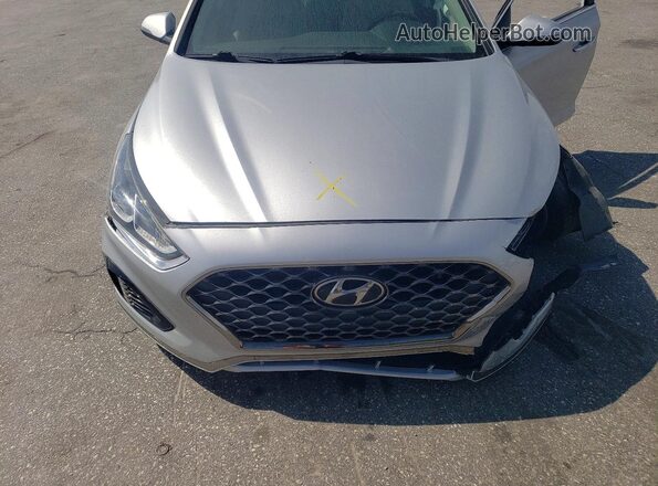 5NPE34AF0KH735994 2019 HYUNDAI SONATA Silver Вид задньої частини салону