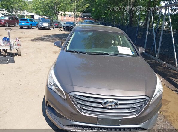 5NPE34AF1HH467031 2017 HYUNDAI SONATA Brown წინა ხედი