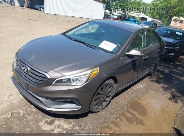 5NPE34AF1HH467031 2017 HYUNDAI SONATA Brown წინა მარცხენა ხედი სამი მეოთხედიდან