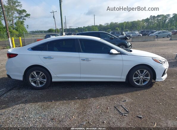 5NPE34AF1JH648197 2018 HYUNDAI SONATA White Rear interior view