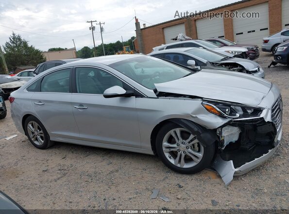 5NPE34AF2JH618559 2018 HYUNDAI SONATA Silver უკანა სალონის ხედი