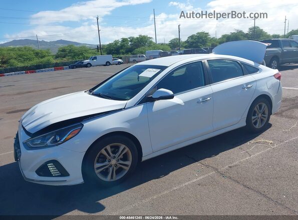 5NPE34AF2KH789314 2019 HYUNDAI SONATA White წინა მარცხენა ხედი სამი მეოთხედიდან