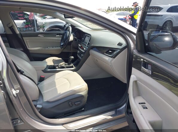 5NPE34AF3JH625536 2018 HYUNDAI SONATA Gray Widok wnętrza z przodu