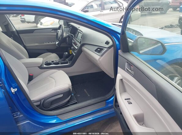 5NPE34AF3KH771310 2019 HYUNDAI SONATA Синий Вид салона спереди