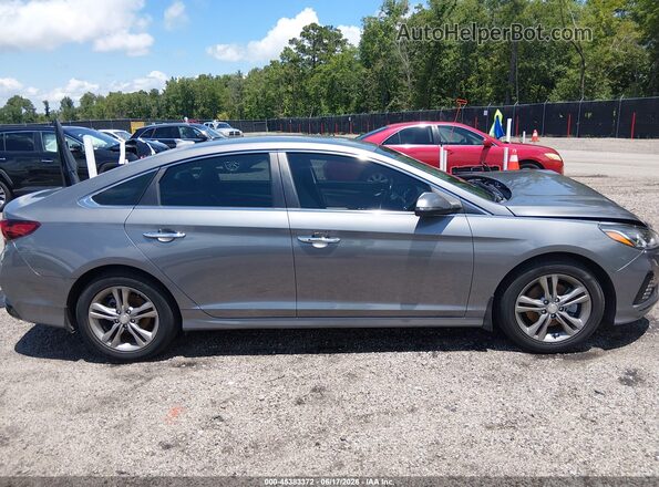 5NPE34AF3KH783991 2019 HYUNDAI SONATA Серый Вид задней части салона