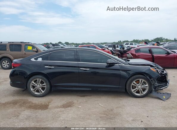 5NPE34AF4JH658884 2018 HYUNDAI SONATA Черный Вид задней части салона