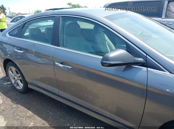 5NPE34AF6JH668753 2018 HYUNDAI SONATA Gray Rear interior view