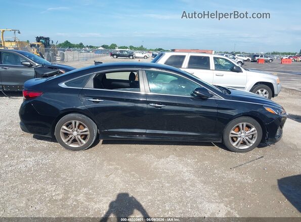 5NPE34AF6KH763752 2019 HYUNDAI SONATA Черный Вид задней части салона