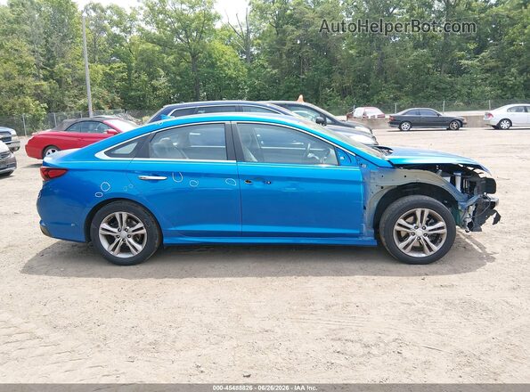 5NPE34AF7JH597496 2018 HYUNDAI SONATA Blue Вид задньої частини салону