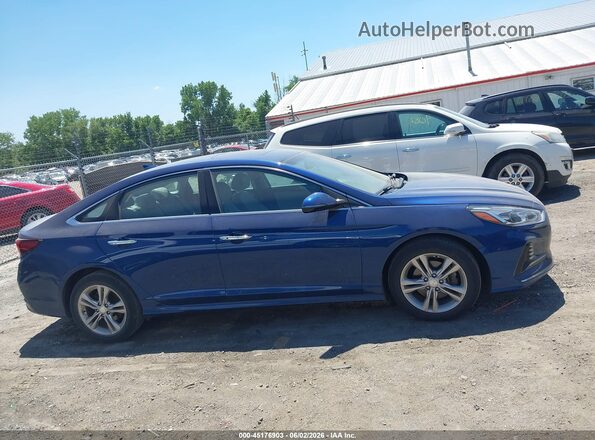 5NPE34AF8JH660069 2018 HYUNDAI SONATA Blue უკანა სალონის ხედი
