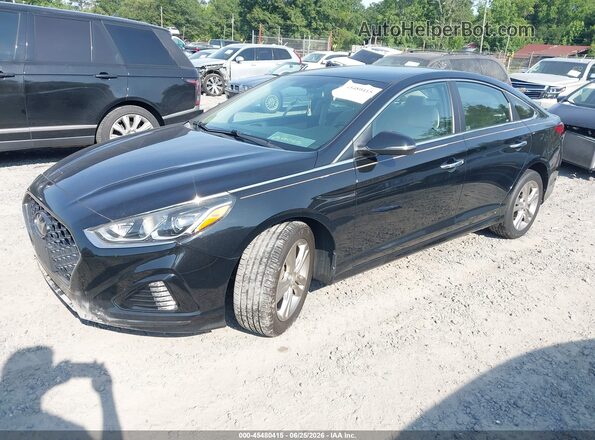 5NPE34AF9KH729028 2019 HYUNDAI SONATA Black წინა მარცხენა ხედი სამი მეოთხედიდან