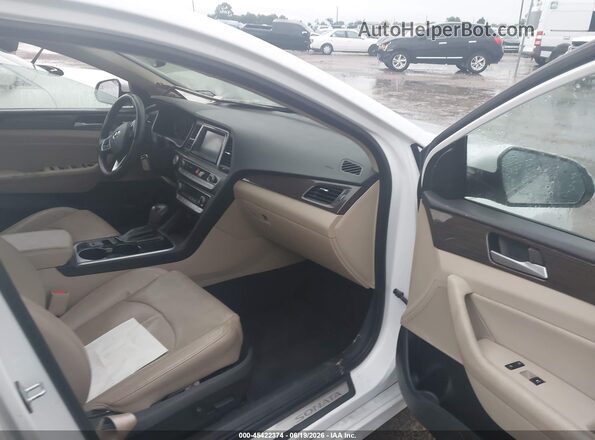 5NPE34AF9KH789990 2019 HYUNDAI SONATA White Widok wnętrza z przodu