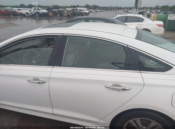 5NPE34AF9KH789990 2019 HYUNDAI SONATA White Widok wnętrza z tyłu