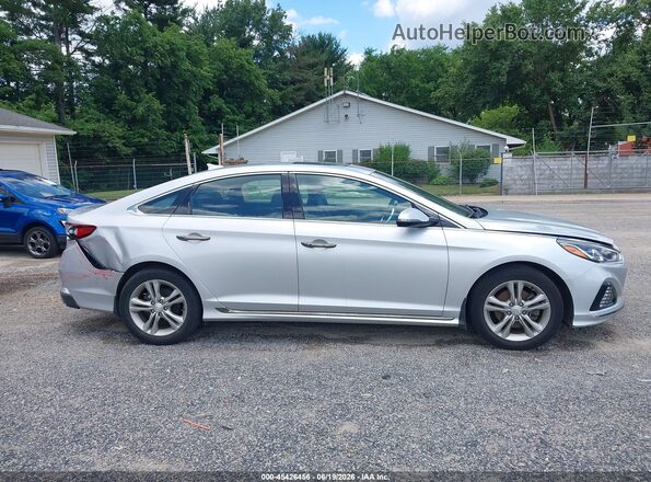 5NPE34AFXJH676953 2018 HYUNDAI SONATA Silver Vista interior trasera