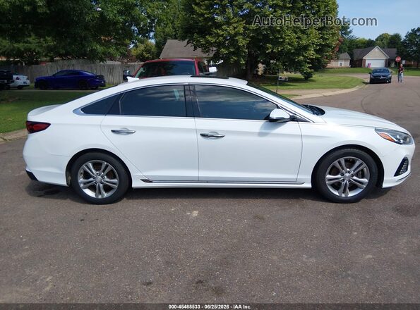 5NPE34AFXJH684549 2018 HYUNDAI SONATA White Rear interior view