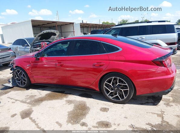 5NPEK4JC8MH126020 2021 HYUNDAI SONATA Red Widok wnętrza z tyłu