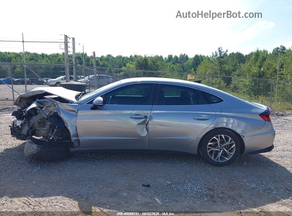 5NPEL4JA2LH034797 2020 HYUNDAI SONATA Серебряный Вид задней части салона