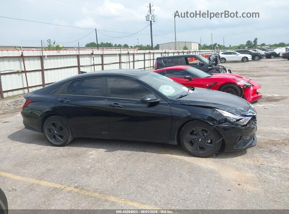 5NPLM4AGXMH045797 2021 HYUNDAI ELANTRA Black Widok wnętrza z tyłu