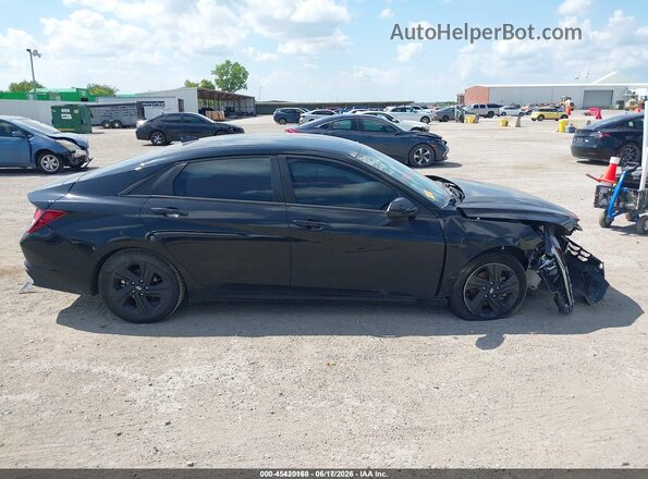 5NPLS4AG3MH036087 2021 HYUNDAI ELANTRA Black Rear interior view