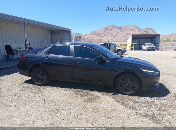 5NPLS4AG5NH056312 2022 HYUNDAI ELANTRA Черный Вид задней части салона