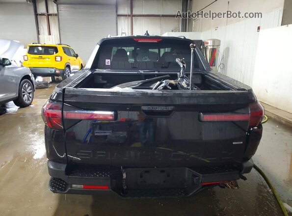 5NTJCDAE4RH096875 2024 HYUNDAI SANTA Black Rear view