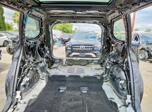 5TDAAAA62SS015531 2025 LEXUS TX Gray Vista de los asientos traseros