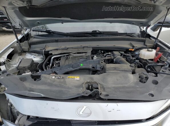 5TDABAB66RS000696 2024 LEXUS TX Silver ძრავის განყოფილების ხედი
