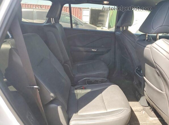 5TDABAB66RS002528 2024 LEXUS TX White Rear seats view