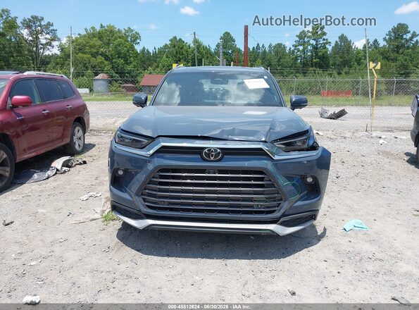 5TDADAB59SS017855 2025 TOYOTA GRAND HIGHLANDER Blue Սալոնի հետևի տեսք