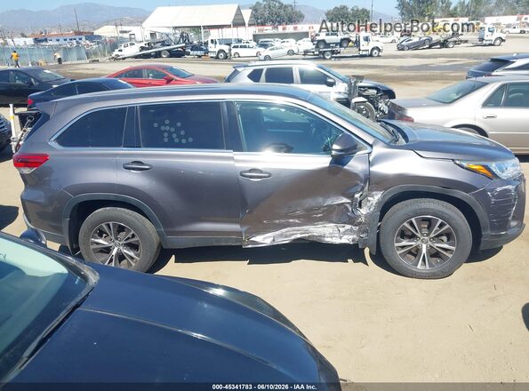 5TDBZRFH3KS978802 2019 TOYOTA HIGHLANDER Gray Vista interior trasera