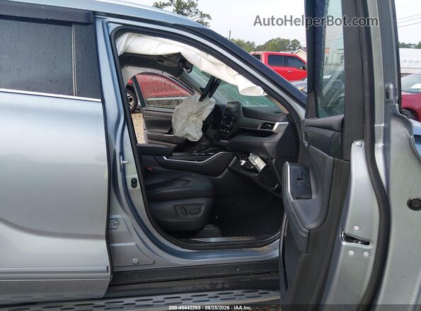 5TDGZRAH2MS085276 2021 TOYOTA HIGHLANDER Blue Front interior view