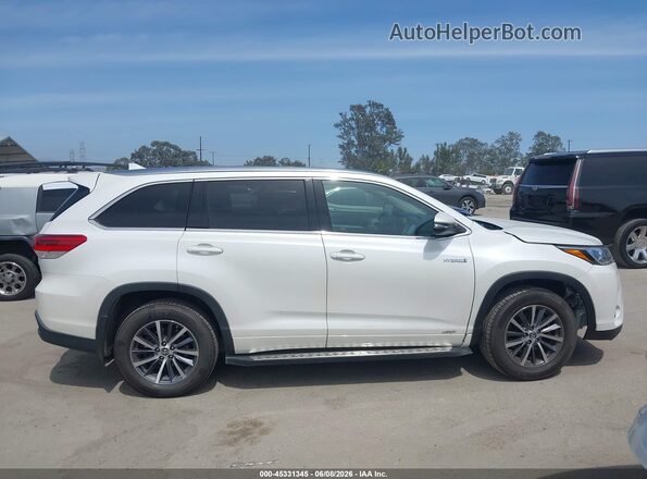 5TDJGRFH7JS042293 2018 TOYOTA HIGHLANDER HYBRID White Rear interior view